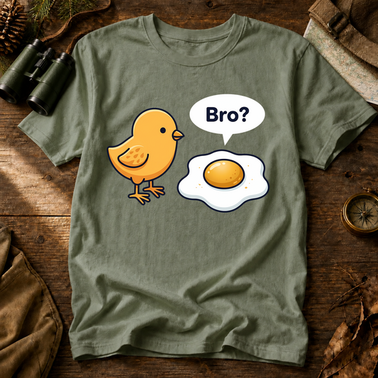 Bro Chick and Egg Tee in Bay, centered front design on a birdwatching flat-lay mockup