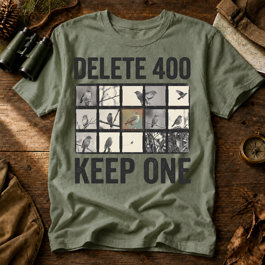 Delete 400 Keep One Bird Photography Tee in Bay, centered front design on a birdwatching flat-lay mockup