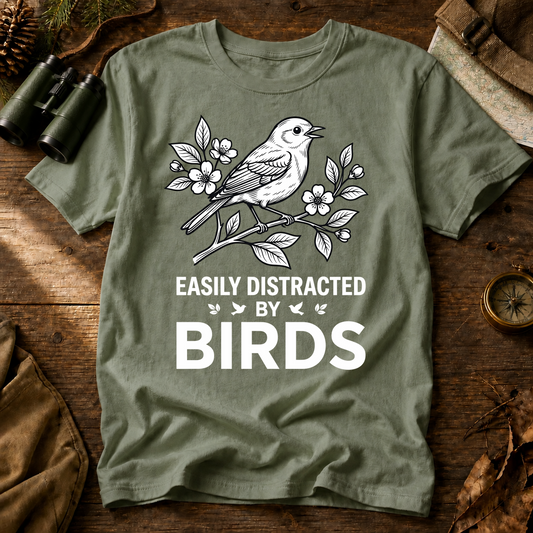 Easily Distracted by Birds Floral Line Art Tee in Bay, centered front design on a birdwatching flat-lay mockup