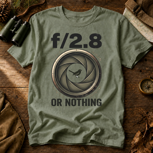 F/2.8 or Nothing Bird Photography Tee in Bay, centered front design on a birdwatching flat-lay mockup