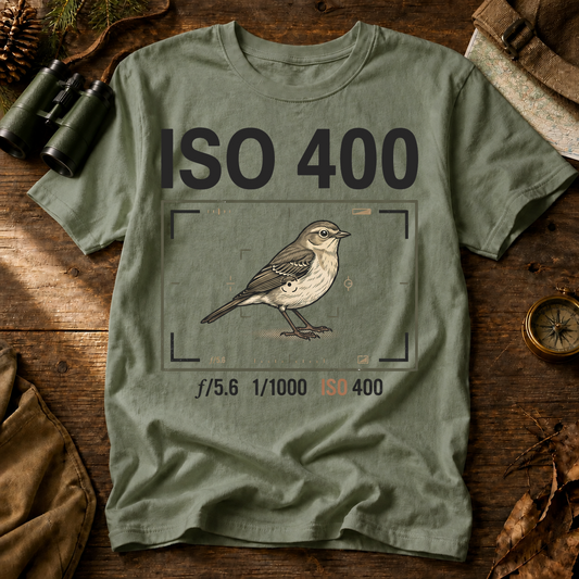 ISO 400 Bird Photography Tee in Bay, centered front design on a birdwatching flat-lay mockup