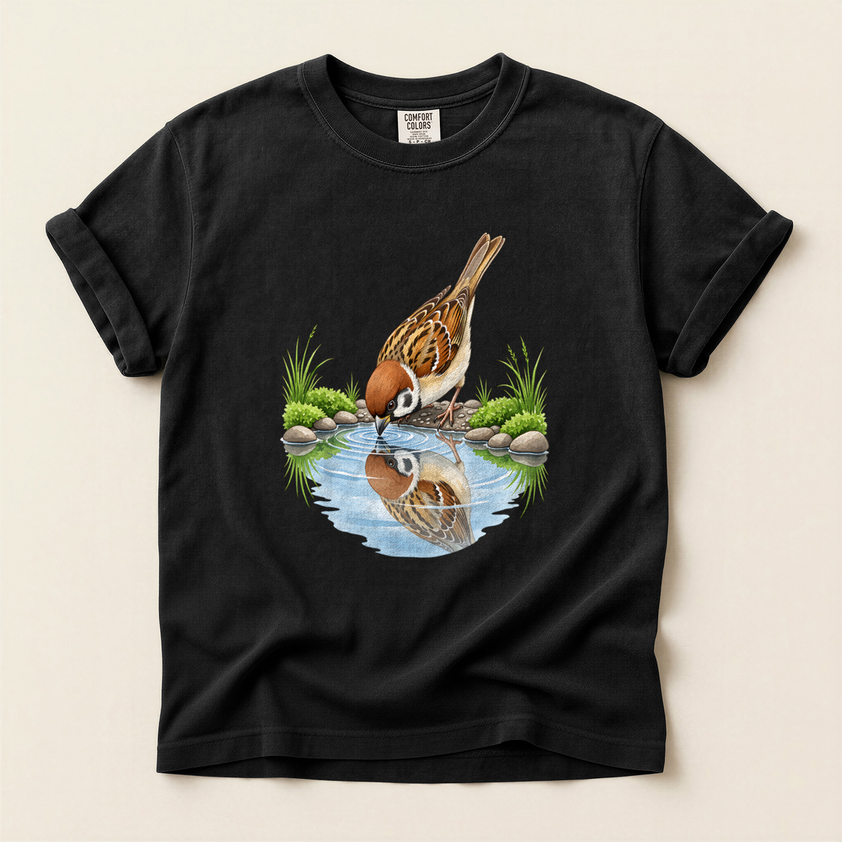 Sparrow Water Reflection T-Shirt in Bay laid beside field gear