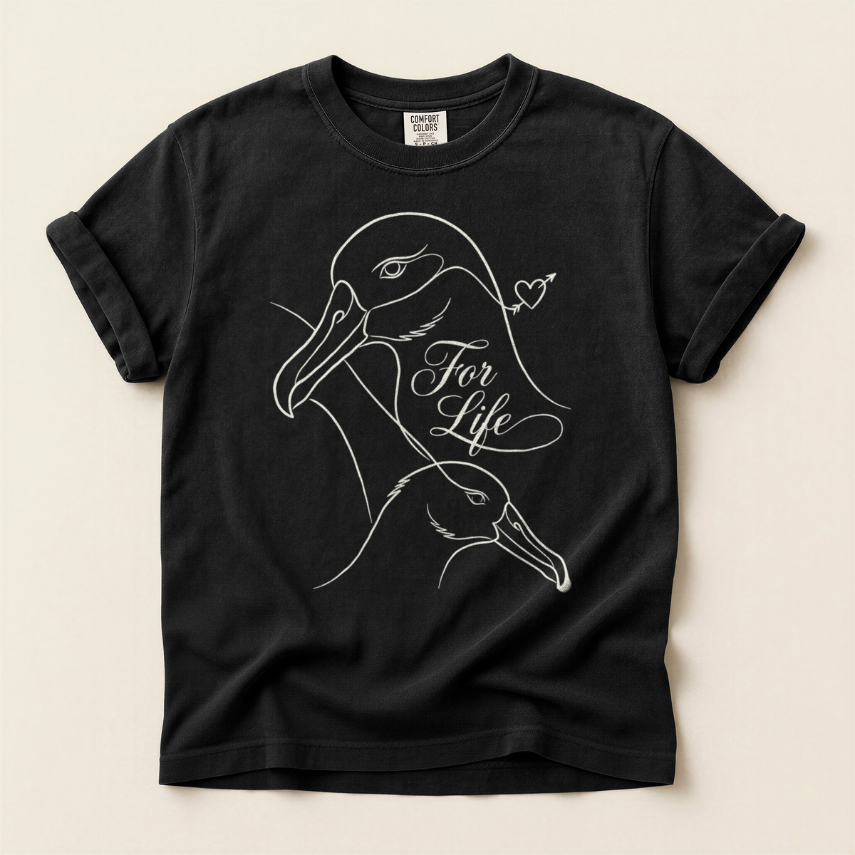 Swans For Life T-Shirt in Bay laid beside field gear