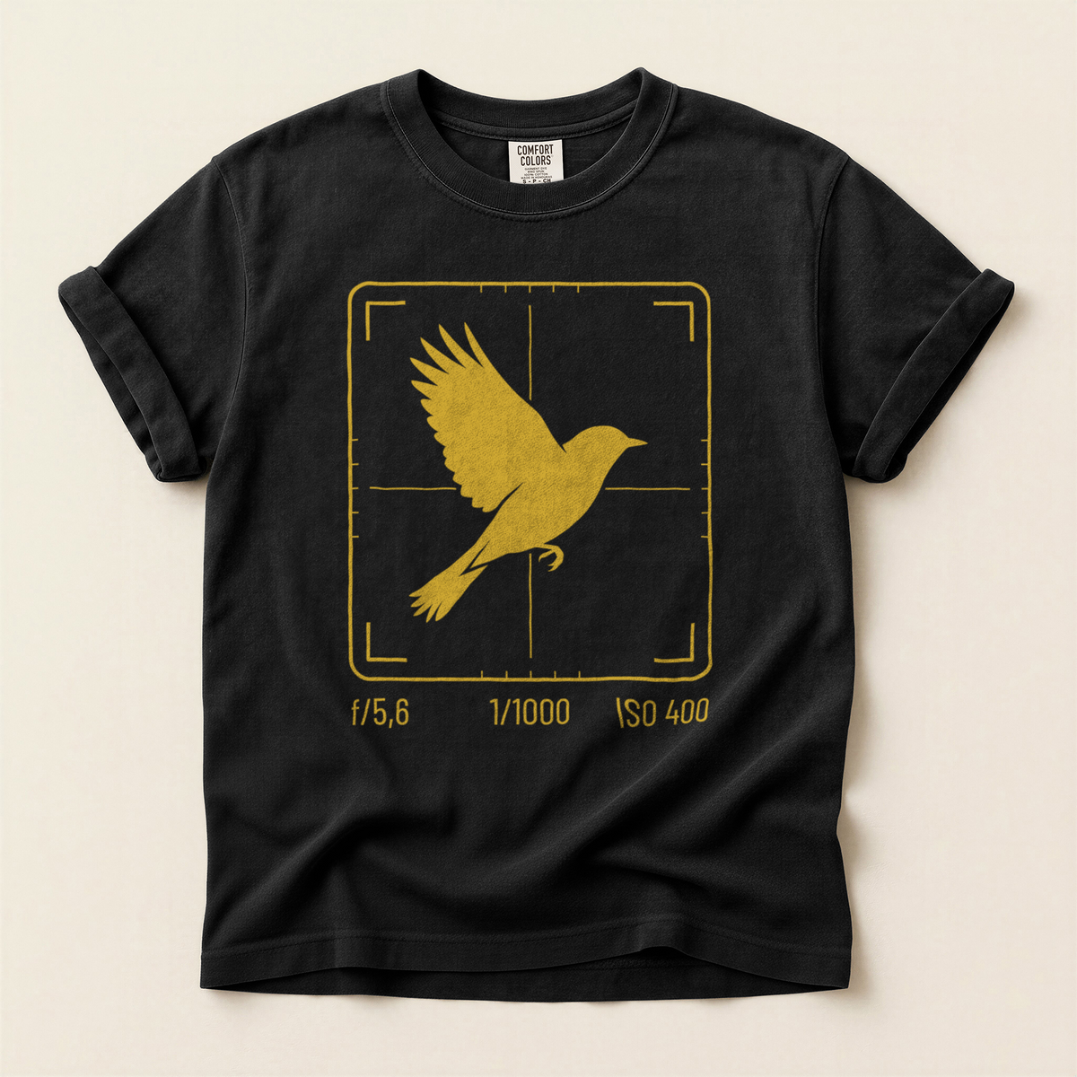 Camera Frame Bird T-Shirt in Bay laid beside field gear