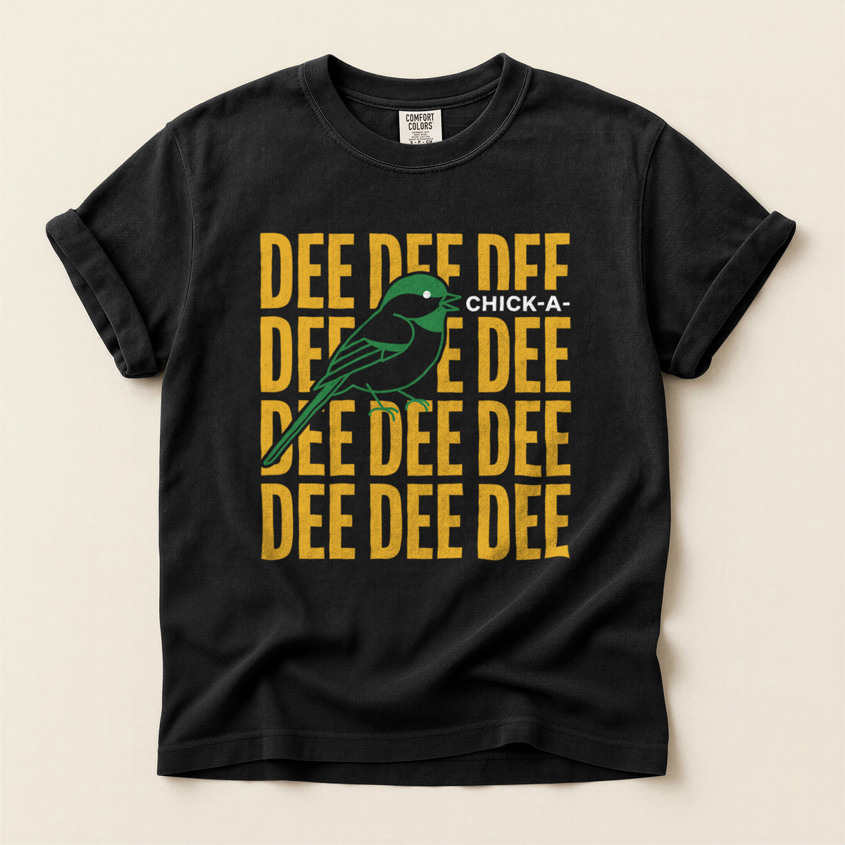 Dee Dee Dee T-Shirt in Bay laid beside field gear