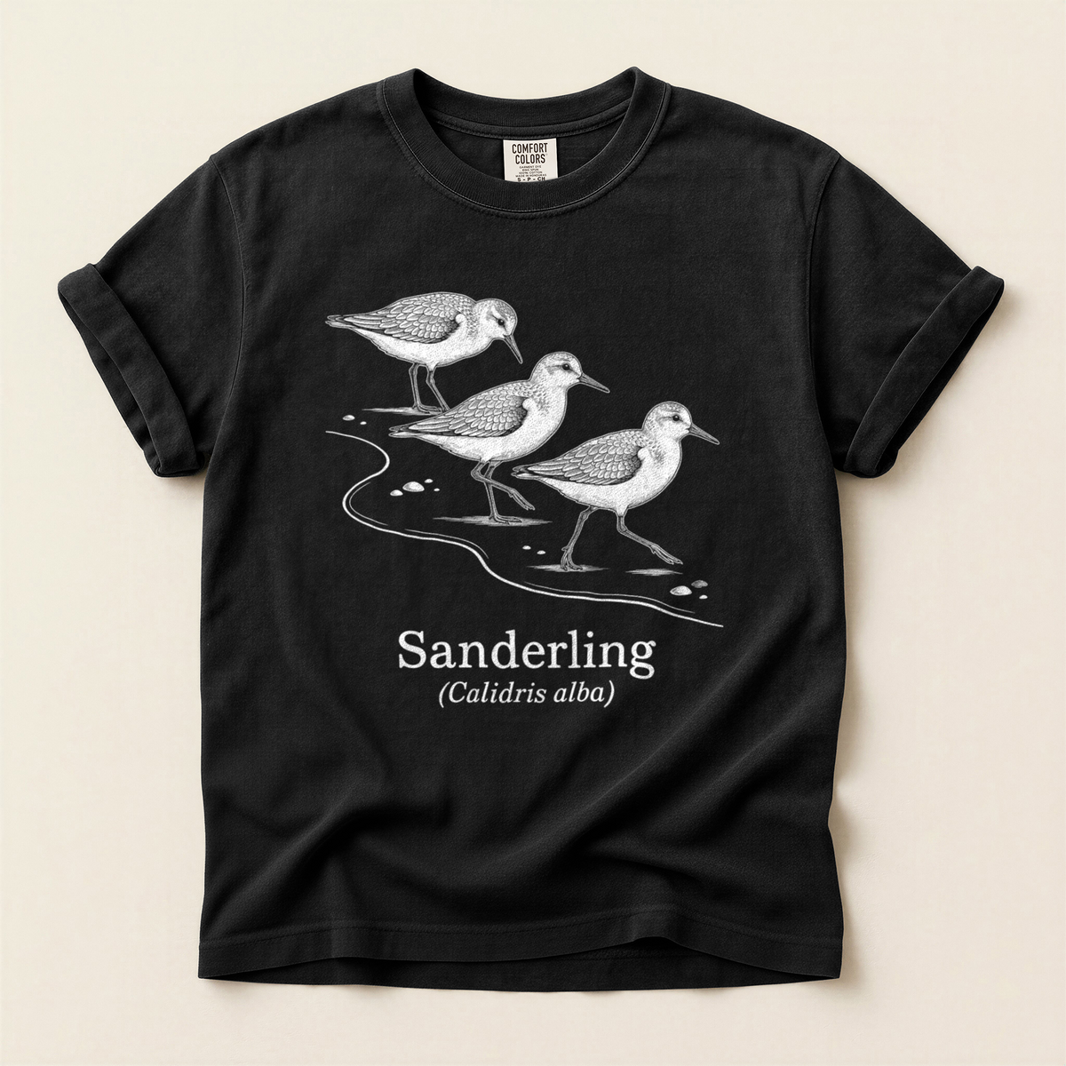 Sanderling Line Art T-Shirt in Bay laid beside field gear