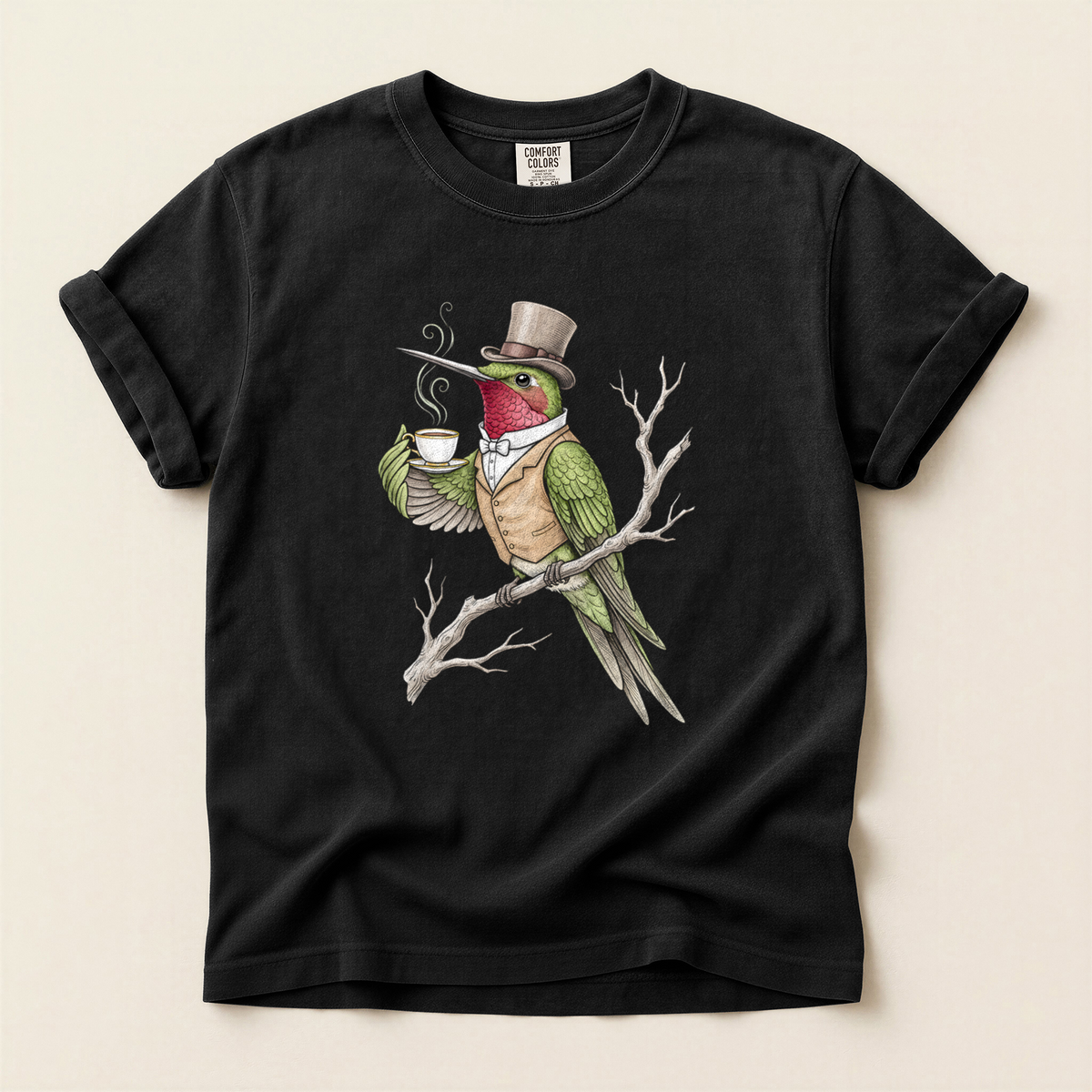 Gentleman Hummingbird Tea T-Shirt in Bay laid beside field gear