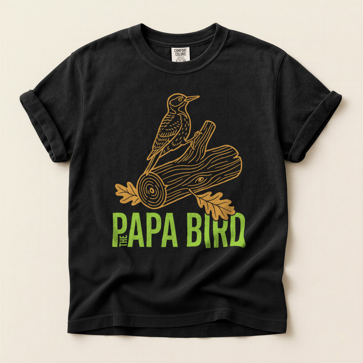 The Papa Bird T-Shirt in Bay laid beside field gear
