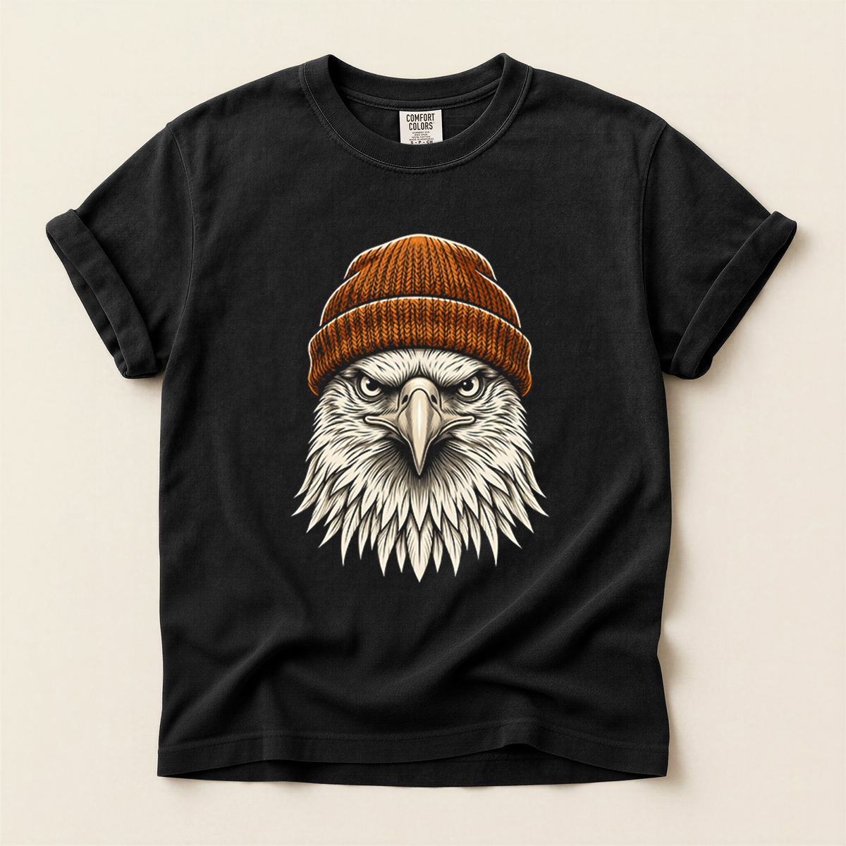Eagle Orange Beanie T-Shirt in Bay laid beside field gear