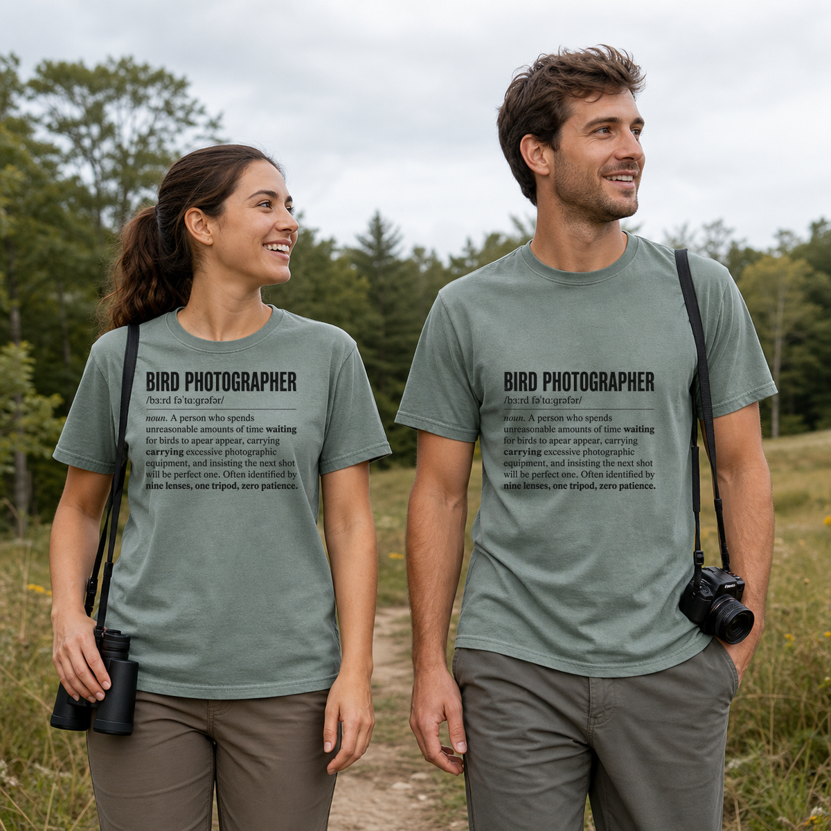 Female and male models wearing the Bird Photographer Definition Tee in Bay, with the artwork centered on both shirts