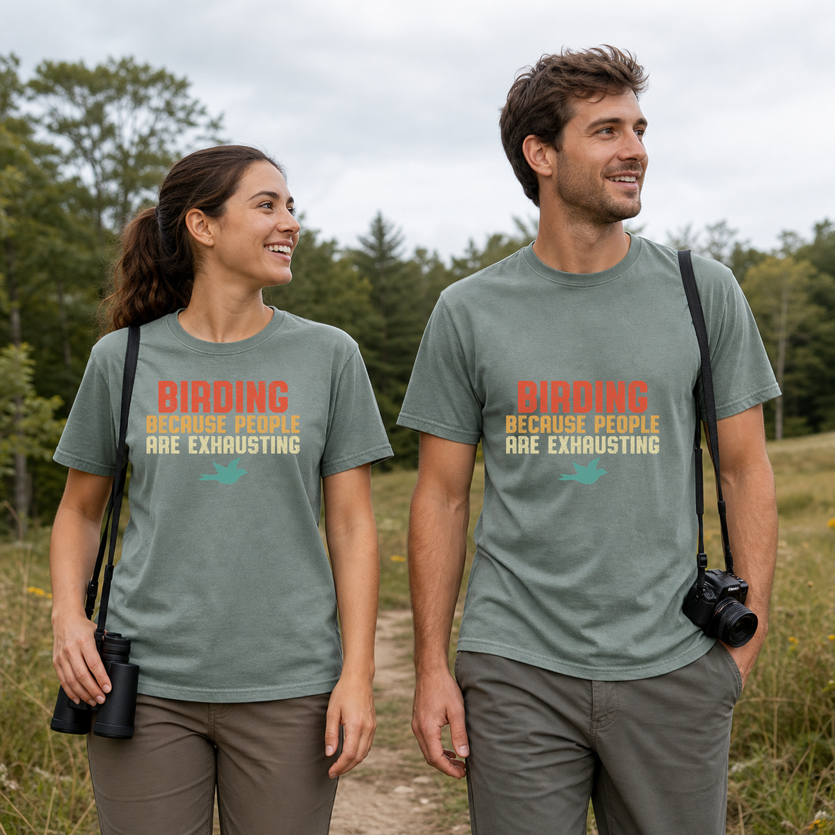 Female and male models wearing the Birding Because People Are Exhausting Tee in Bay, with the artwork centered on both shirts