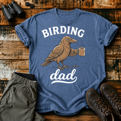 Birding Dad Coffee Bird Tee in Blue Jean, centered front design on a birdwatching flat-lay mockup