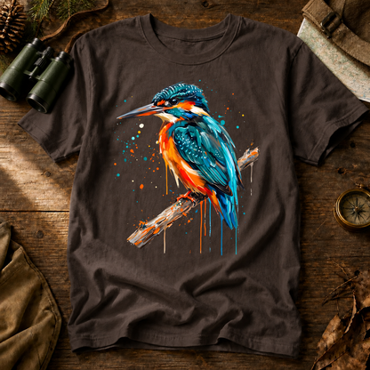 Common Kingfisher Watercolor Tee in Espresso, centered front design on a birdwatching flat-lay mockup