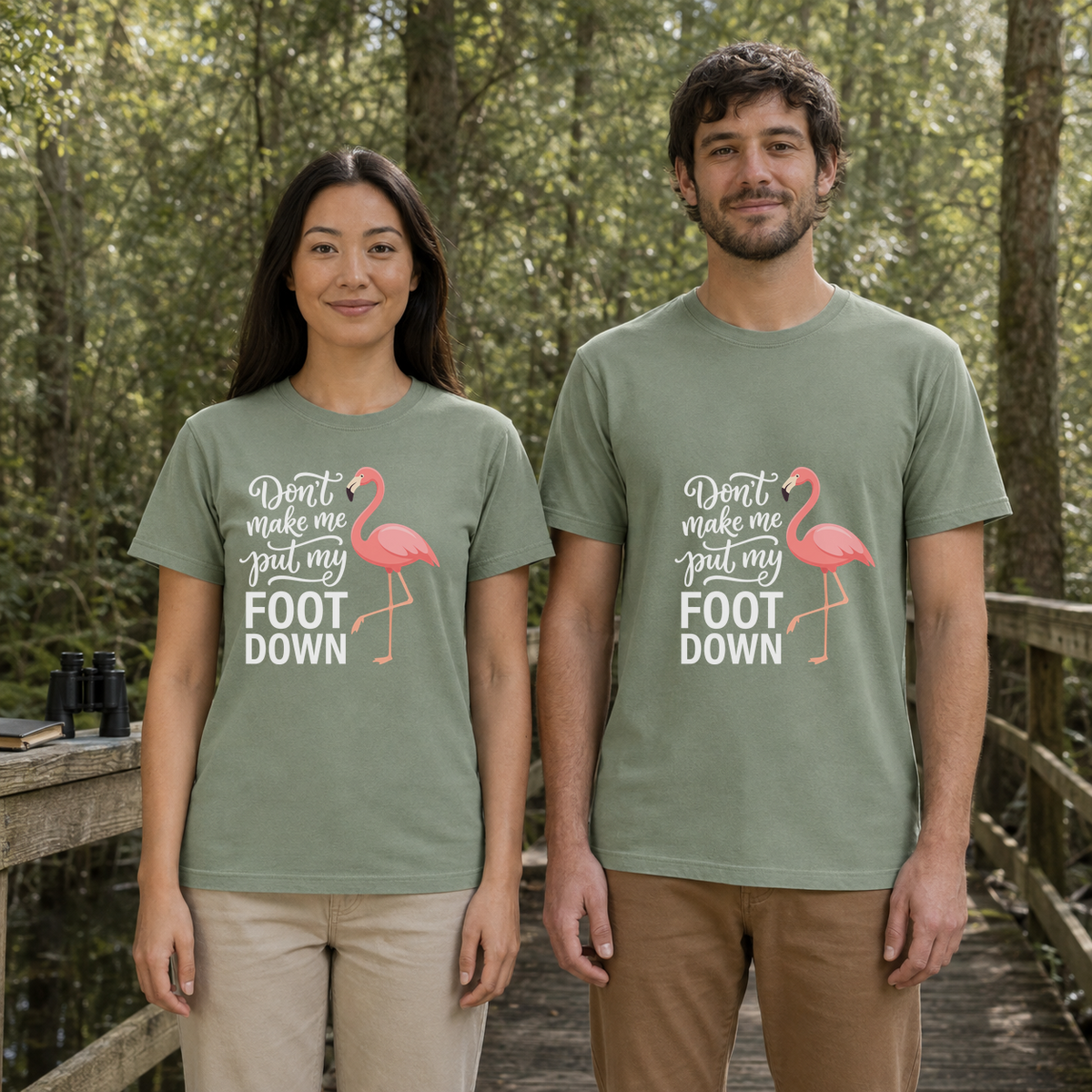 Female and male models wearing the Flamingo Foot Down Tee in Bay, with the artwork centered on both shirts