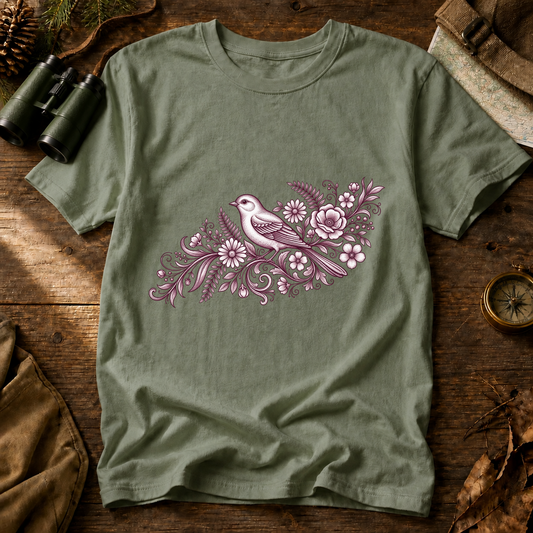 Floral Songbird Branch Tee in Bay, centered front design on a birdwatching flat-lay mockup