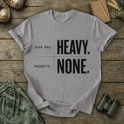 Gear Bag Heavy Regrets None Tee in Grey, centered front design on a birdwatching flat-lay mockup