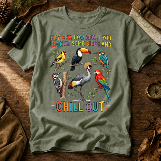 Hey Bro Look at Some Birds and Chill Out Tee in Bay, centered front design on a birdwatching flat-lay mockup