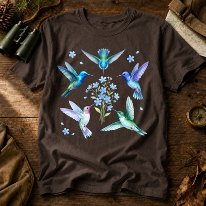 Hummingbird Floral Circle Tee in Espresso, centered front design on a birdwatching flat-lay mockup