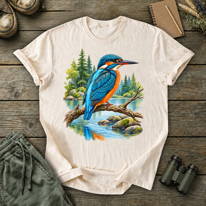 Kingfisher Woodland Stream Tee in Ivory, centered front design on a birdwatching flat-lay mockup