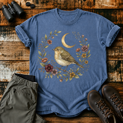 Moonlit Songbird Floral Wreath Tee in Blue Jean, centered front design on a birdwatching flat-lay mockup