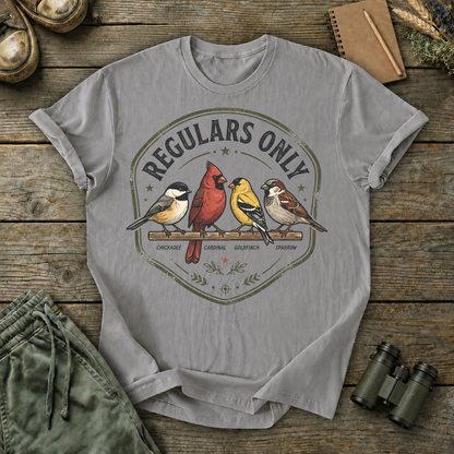 Regulars Only Backyard Birds Tee in Grey, centered front design on a birdwatching flat-lay mockup
