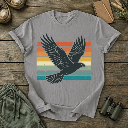 Retro Flying Bird Stripes Tee in Grey, centered front design on a birdwatching flat-lay mockup