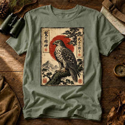 Vintage Japanese Raptor Art Tee in Bay, centered front design on a birdwatching flat-lay mockup