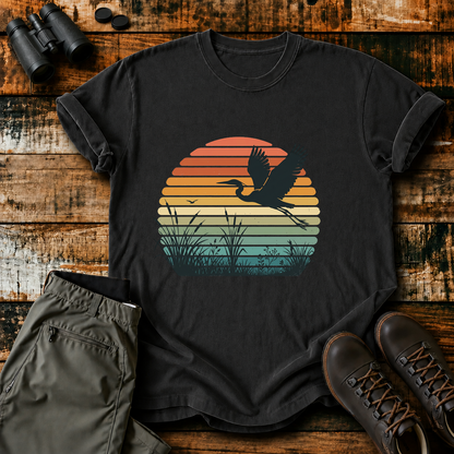 Vintage Sunset Marsh Bird Tee in Black, centered front design on a birdwatching flat-lay mockup
